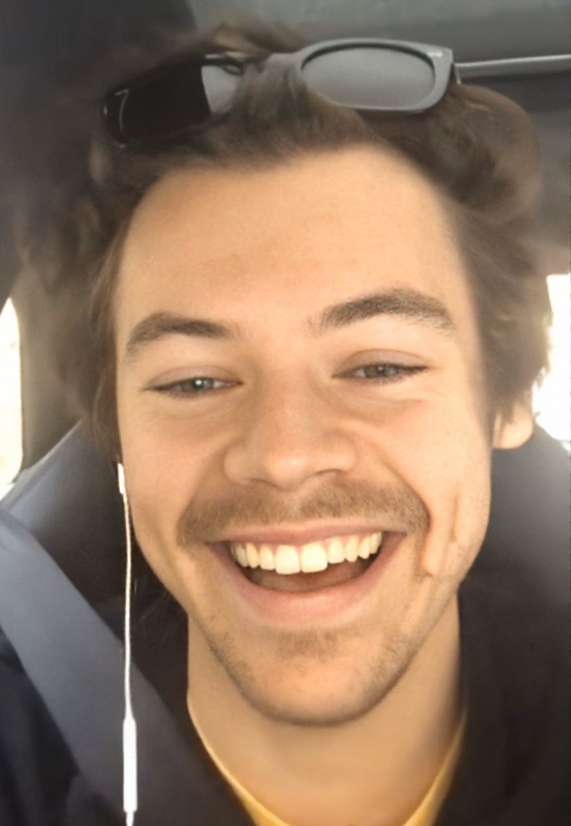 Harry Styles smiling but his smile keeps getting bigger as you scroll down.