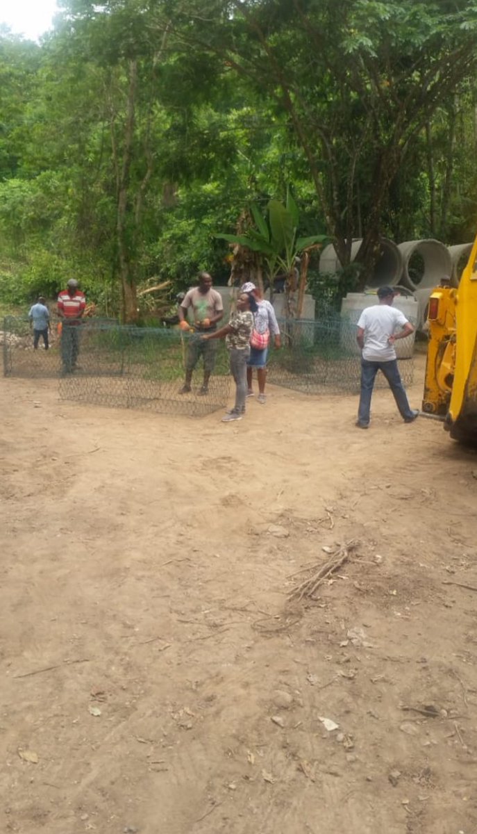 DrNormanDunn's tweet photo. The long awaited Baxter's Mountain Rehabilitation project has started. We are building a #fording to ensure emergency vehicles &amp; large units can enter the community. After 30+ years of contending with a dilapidated bridge, we are #GettingItDunn. @NWA_JA @jlpjamaica #MPDunnAtWork https://t.co/eBxq3H9NUD