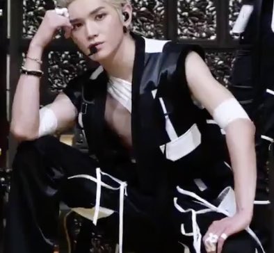 another one, they covered taeyong’s arm tattoos last time just to show his new fake ones... I’m so lost