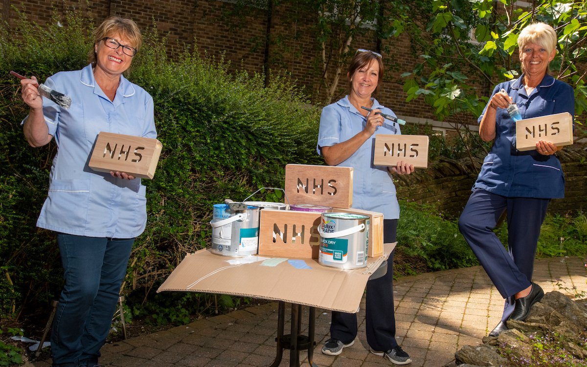 DCHFT's tweet photo. Meet Sue, Kim and Andrea! They have been supporting the @nhslightbox project to provide a cheerful project for the communities during the pandemic. Money raised from the boxes has been donated to the #NHS and @dch_charity! 🖌️🌈 https://t.co/gkgtAYsMy1