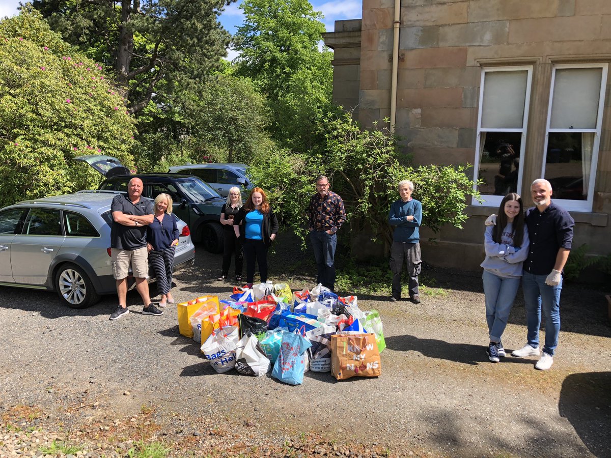 SMFC_CF's tweet photo. Feel Goody Friday! 😃1st up huge THANKS to the Swansons for rallying all of their neighbours &amp; donating this huge amount of goods🙏🏻B 4 anyone asks that’s Jim’s daughter he’s cuddling so no distancing rules were broken😂@saintmirrenfc @stmirrenwfc @smisatrust @STARprojPaisley https://t.co/ZPnWUOAK2a