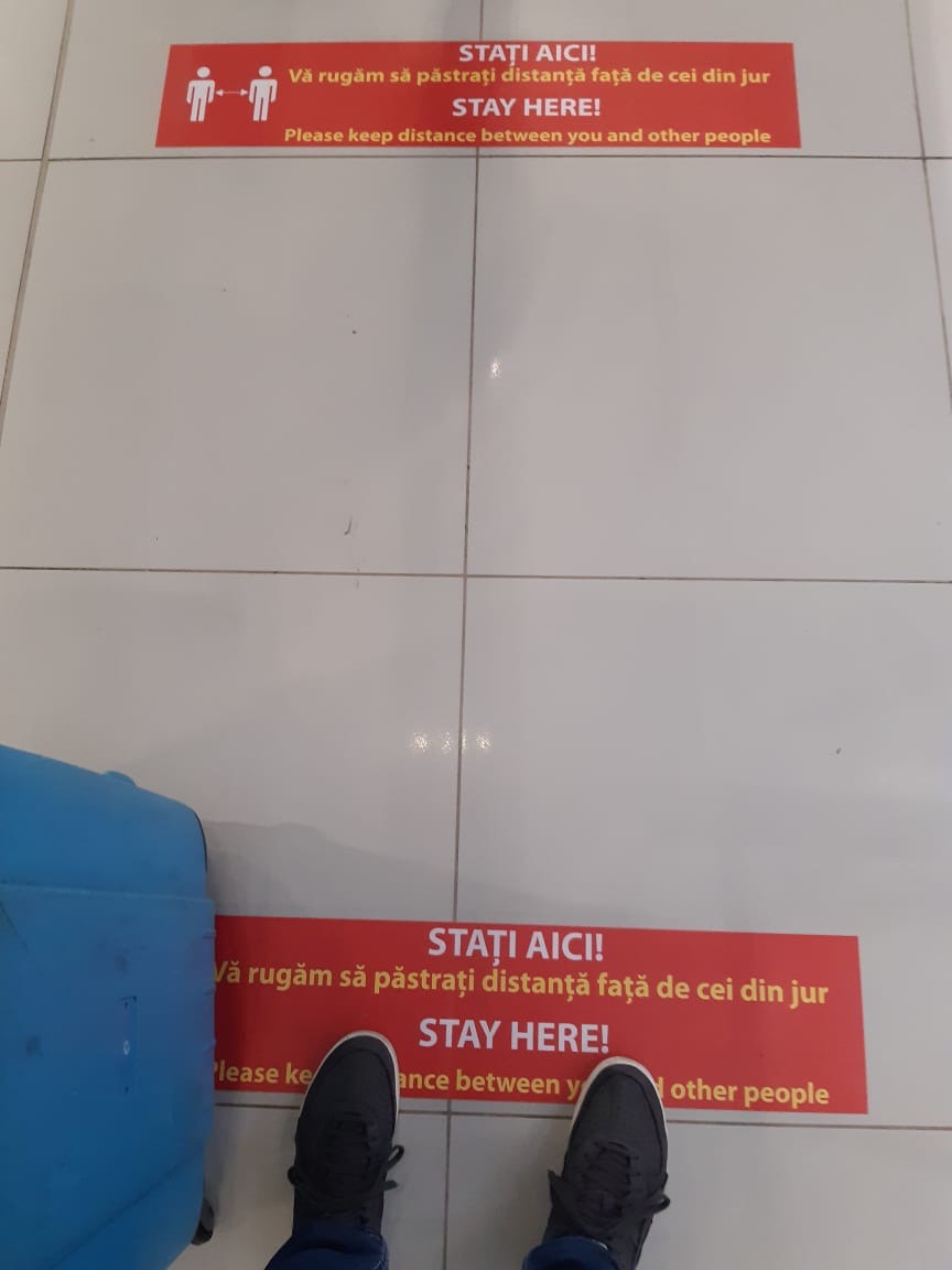 In Bucharest airport only 1 meter distancing, continuous announcements to stay away from other people