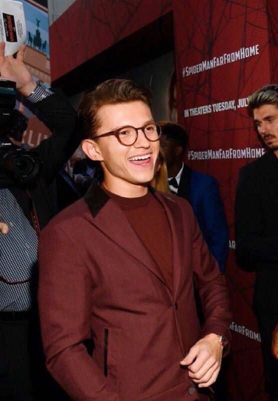here’s tom holland smiling to bless your day: a thread