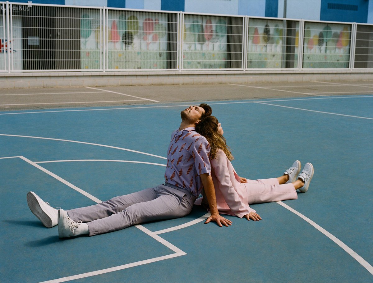 Here's a picture of us sat on a random basketball court in Barcelona because the alternative is a photo of us sat on the sofa watching reruns of the office with greasy hair, no future plans and kale in our teeth. Still a mood tbf. Happy weekend ☀️ pic.x.com/NbMBcXceMH