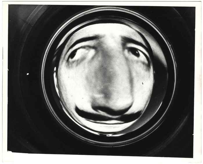 Weegee was hired (but not credited) as a "special effects advisor". Kubrick probably got some visual inspiration from some of the shots he took. Here is Peter Sellers as Group Captain Mandrake, in Weegee's patented distorted view.