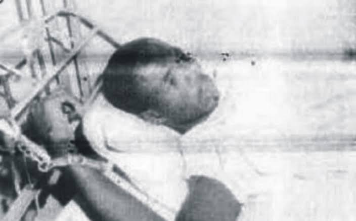 He confessed that he was Anini, rolling on the floor in pain, he was whisked away.He was transferred to the military hospital, heavily guarded for treatment, his bullet ridden leg was eventually amputated.He was then confined to a wheelchair for his interrogation and trial.