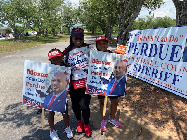 ForPerdue's tweet photo. So proud to have two of my star track athletes come out today and assist with the early voting campaign. #TeamWork #CommunityEngagement https://t.co/m2Mk94HxCL