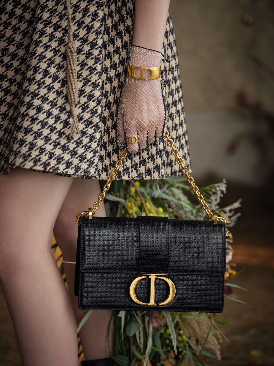 Dior's tweet photo. A highly-focused attention to detail sets the #DiorSS20 collection by Maria Grazia Chiuri https://t.co/3iEZMJqGqn apart - whether it’s the 'Microcannage' of a #Dior30Montaigne bag or its signature initials gracefully wrapping around a finger as a strikingly modern ring. https://t.co/p8KyzVymOI