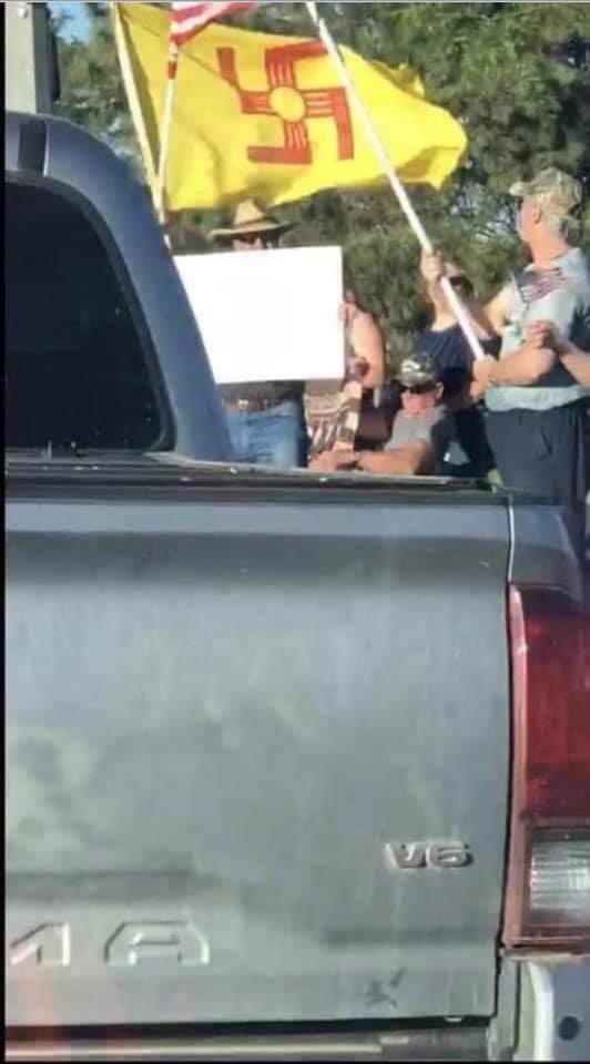 The white settler fascists in Apache, Pueblo, and Navajo lands appropriated the sacred Zia symbol & turned it into a symbol of hate. These photos were taken at an “anti-lockdown” rally in Farmington, NM, the center of the oil & has industry bordering the Navajo Nation.