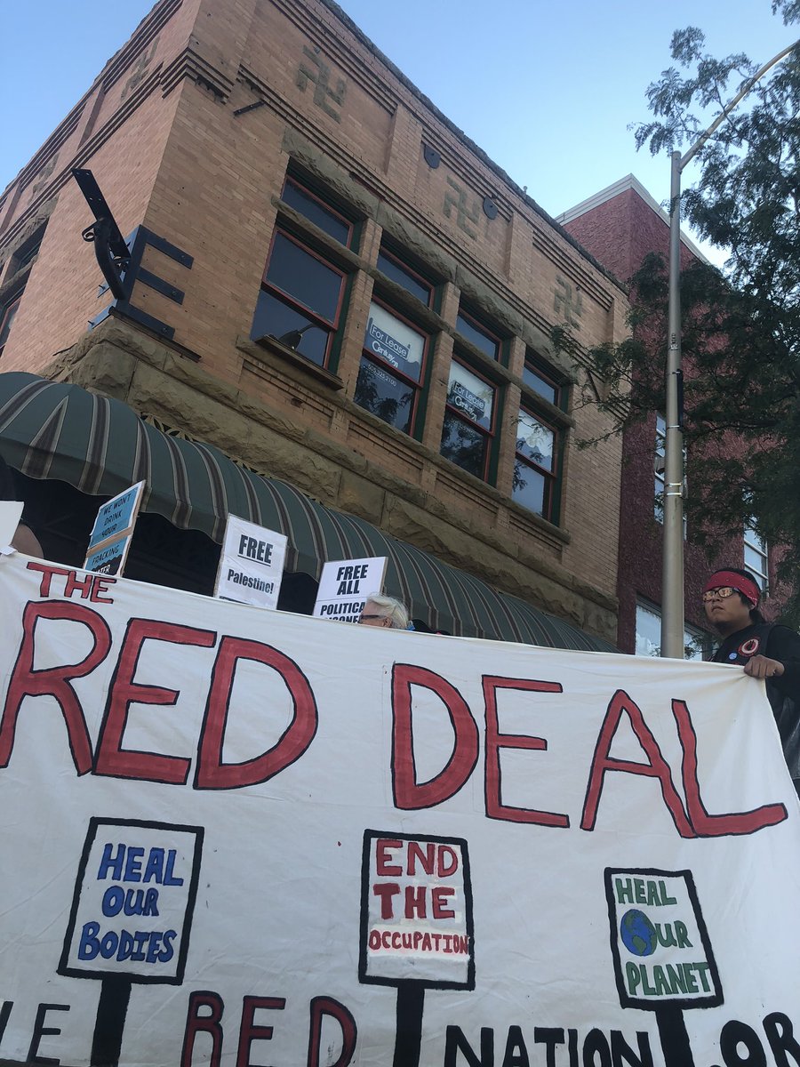 For reference, this building in downtown Farmington has swastikas, which according to local Navajo residents were made by the original owner to celebrate Hitler. This pic was taken last year during a “racist tour” of Farmington led by the local AIM chapter and  @The_Red_Nation.