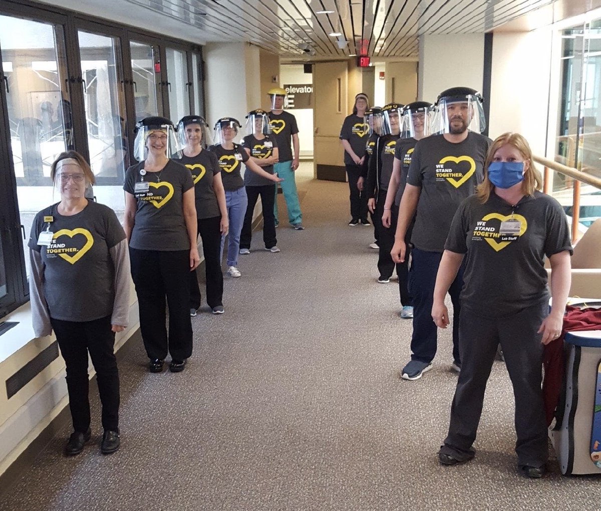 UIPathology's tweet photo. Standing together-- 6 feet apart. @uihealthcare #socialdistancing #facemask #faceshield #pathology #labmedicine #COVID19 #UIHCstrong https://t.co/gw1kUsKj58