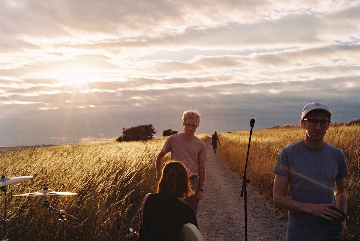 thisgiantpeach's tweet photo. Swipe through to see some behind the scenes snaps from filming the #musicvideo for our single melatonin a couple years ago 🎥 safe to say we found a pretty good spot in the #sussexdowns 🌅 #35mm #filmphotography https://t.co/ZU9Nezmfs8