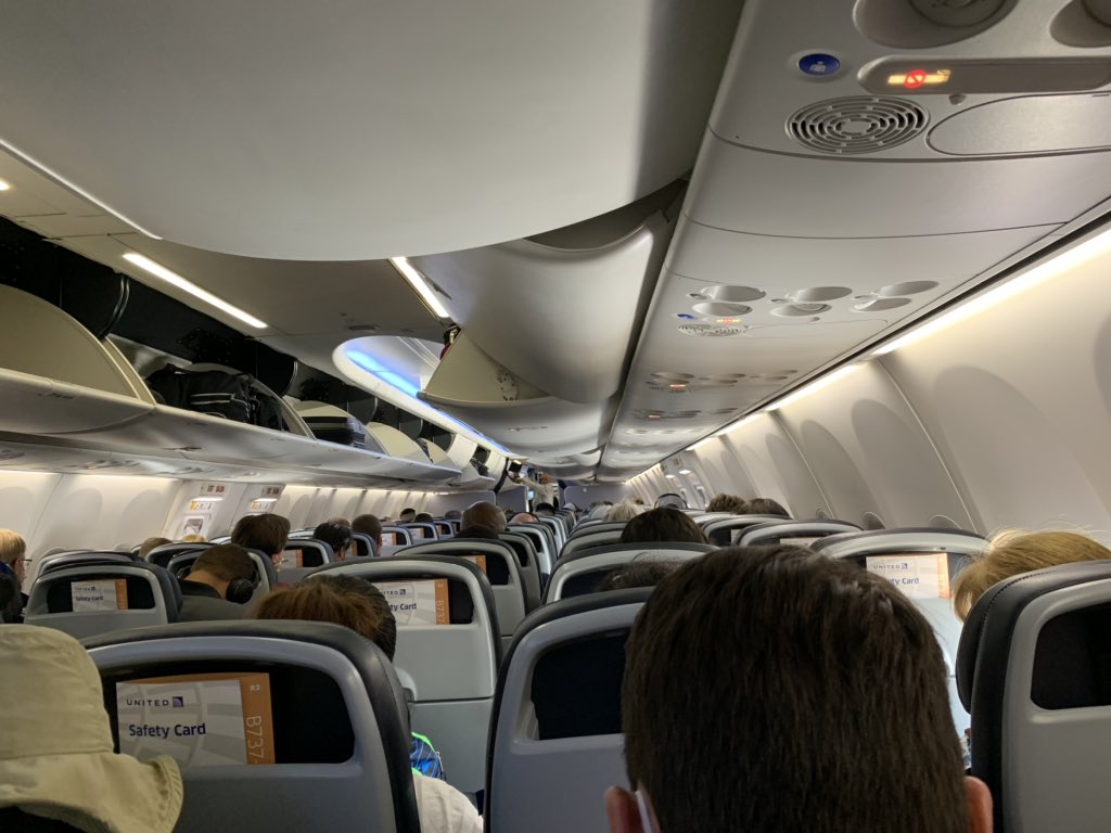 TotalPatriot's tweet photo. @united Social Distancing? Another steaming pile of United BS https://t.co/6aUe8TpkwB