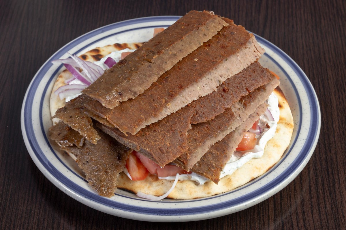 Hungry? Our traditional gyro pita won't let you down. Stacked high with so much gyro slices there's no way not to be messy. Sliced fresh per order and topped with our homemade tzatziki, red onions and tomatoes
Order online at order.tgsh.ca or give us a call 613-695-4477