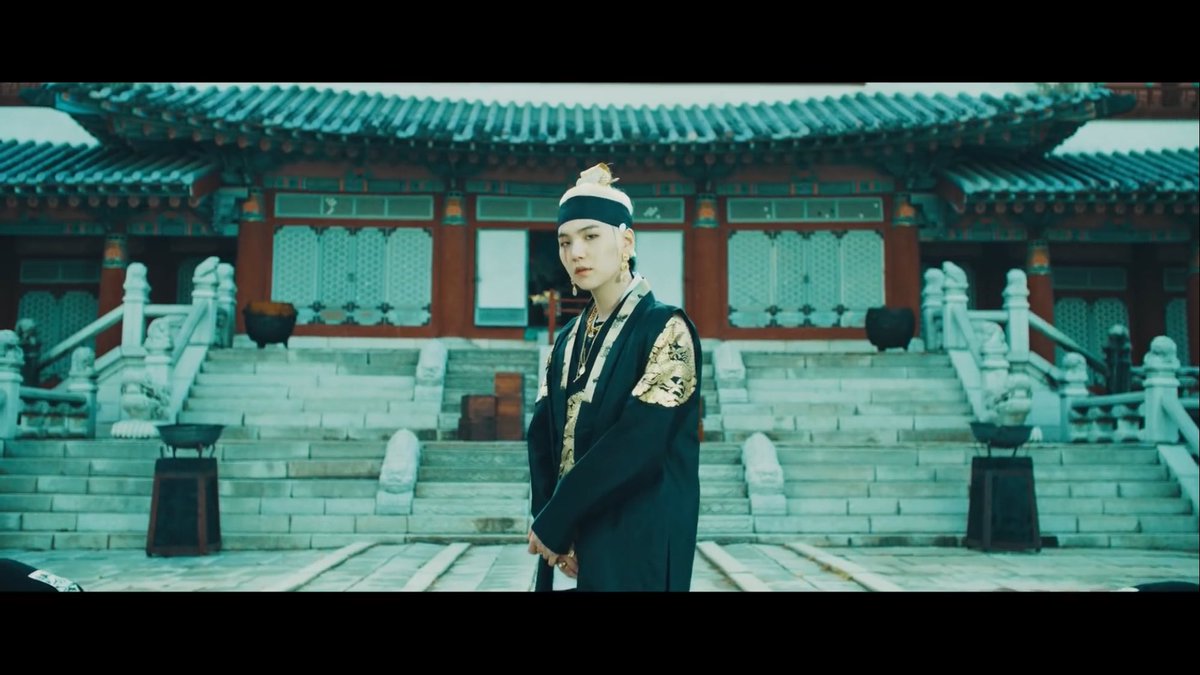 Okay, but he looks so pretty? And the temple behind him is a massive vibe