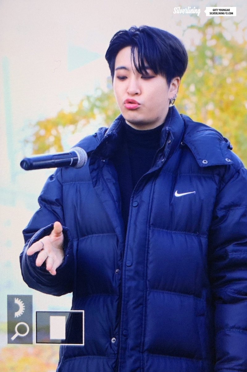 babie playing with his microphone