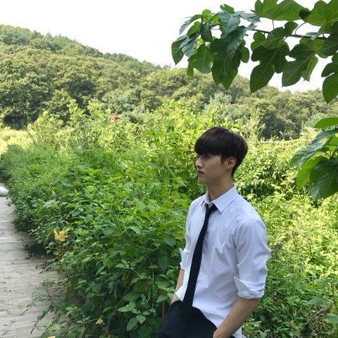 changgu with trees/plants as his background a thread @CUBE_PTG