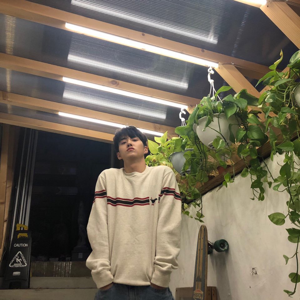 changgu with trees/plants as his background a thread @CUBE_PTG