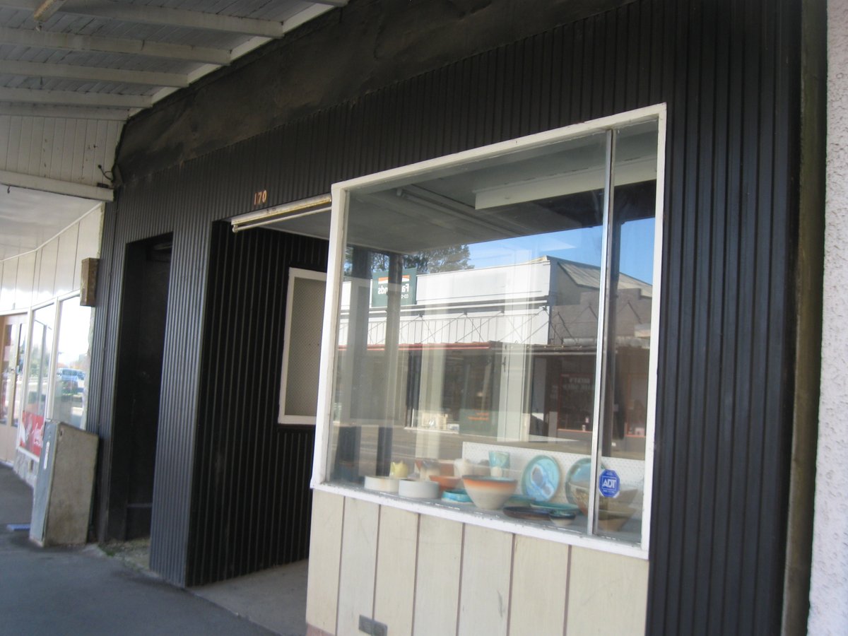 Main St documentary cont: pre & post Covid: 1. Originally Ketteg's, Mick Gonley bought/rebuilt (Winnie Davin's father) here in 1919, CC 0; 2. Cont. as barber/stationers w/diff owners, here Carletons Chemist 1991, CC BY; 3. A Cut Above 2008, CC BY; 4. Now a residence/retail, CC BY