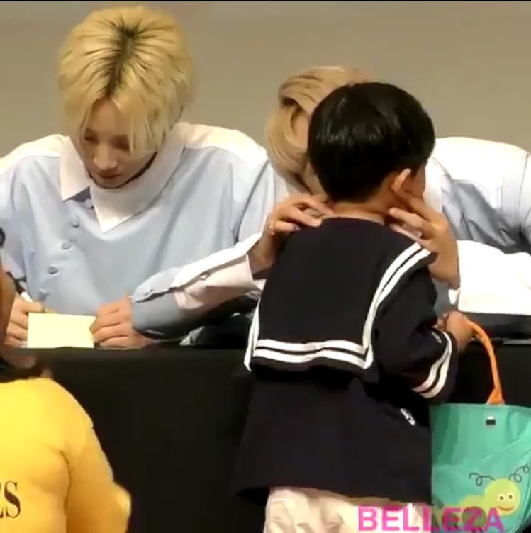 let's add this pic of seungkwan kissing a little boy on the cheek  he is so precious