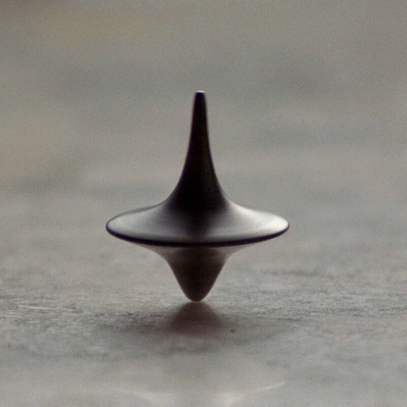 Factsonfilm's tweet photo. Inception's ending was left ambiguous by Christopher Nolan, but Michael Caine let it slip that Nolan told him anytime he appears, its reality, meaning Cobb finally reunites with his kids

Caine has no idea what #TENET is about because Nolan didnt give him the script while filming https://t.co/cvgVA3D53n