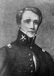 Starting back at page 128 here  https://babel.hathitrust.org/cgi/pt?id=hvd.li3hlp&view=1up&seq=146 , Dealey is going to be focusing on Sherman, TX, comparing it to Washington DC and named for "another great man" but this probably isn't the Sherman you're looking for.  https://en.wikipedia.org/wiki/Sidney_Sherman