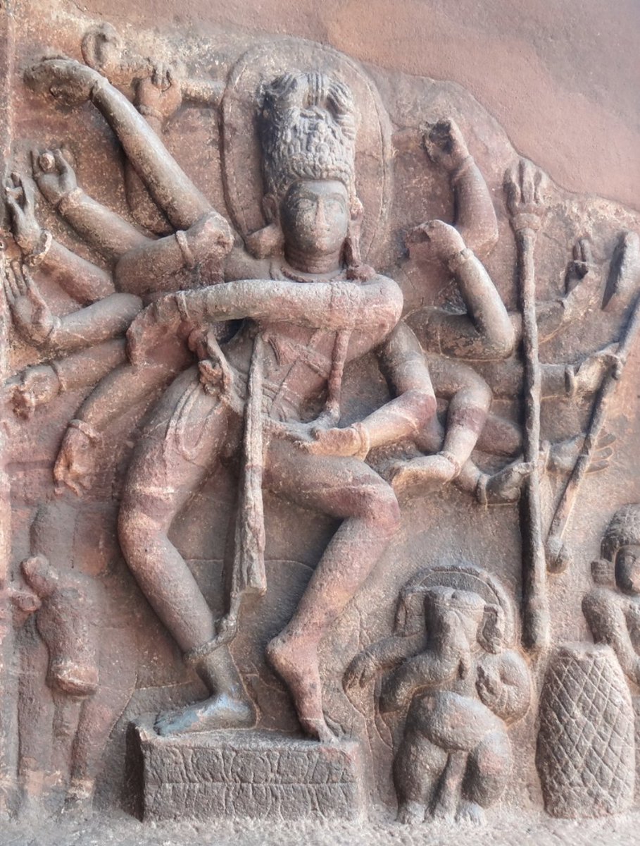 It is during the Pallava period that the four armed Shiva with the raised leg and the "dwarf" made their appearancePrior to Pallavas, in the Natarajas up north, the knees are pointed outward and both feet touch the groundE.g. this Badami Nataraja from 6th cen