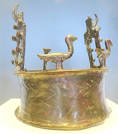 But some of these cylindrical objects were definitely not pointy bottom vessel stands...Like this one...Topped with birds and some strange structures with ibex goat horns attached to them...