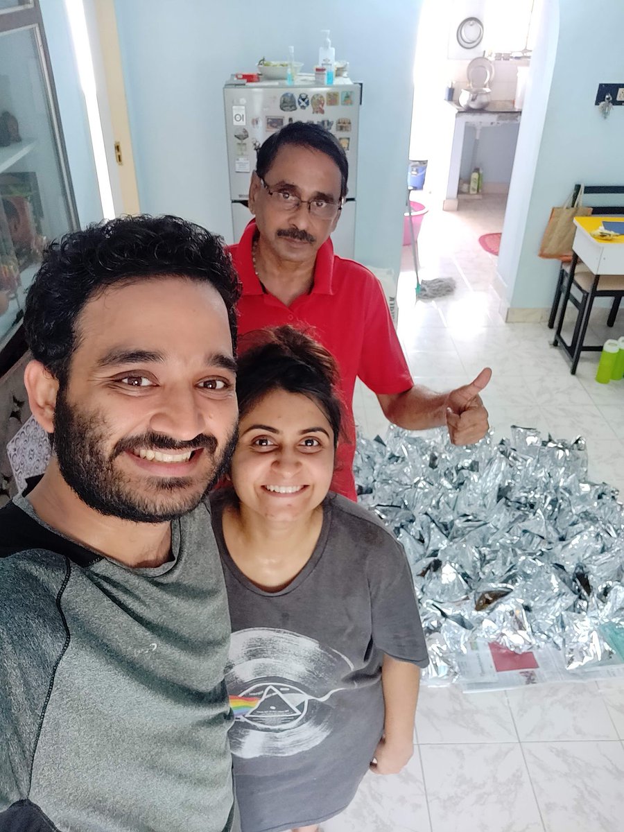 We ended up making 102 packets of Puliyogre. It took us about 6 hours to do this - 7:30AM to 1:30PM. Non stop. We then put everything in the center of the hall, put 2 lines of lakshman rekha around it and then a line of turmeric+chilly paste to keep away our ant friends