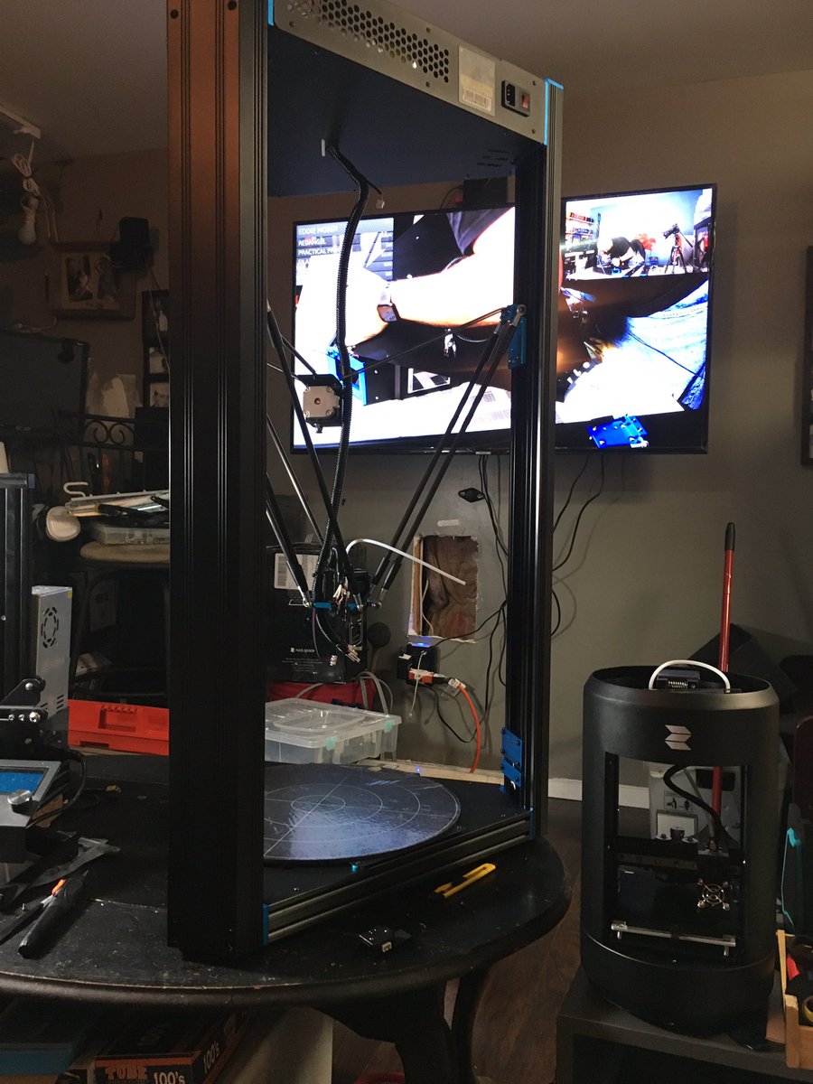 cdp1279's tweet photo. Coffee table is a bit crowded this morning.  Started Assembling my Anycubic predator so far so good, everything seems extremely well though out.  Resisting to throw skr 1.3 and tmc2208 I have in spare parts bin.  #3dprinting  #anycubic  #deltakinomatics https://t.co/V5IUEjFl04