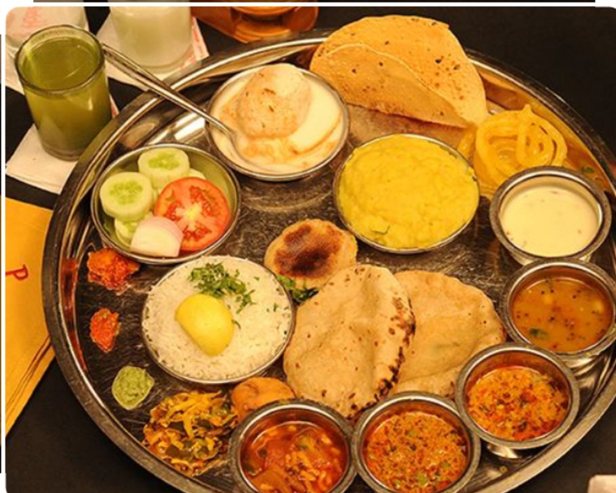  #GujaratiGujarati cuisine is that of the state ofGujarat, in western India. The typical Gujaratithali consists of rotli, dal or kadhi, rice, and shaak (a dish made upof several different combinations of vegetables and spices, which may be either spicy or sweet).