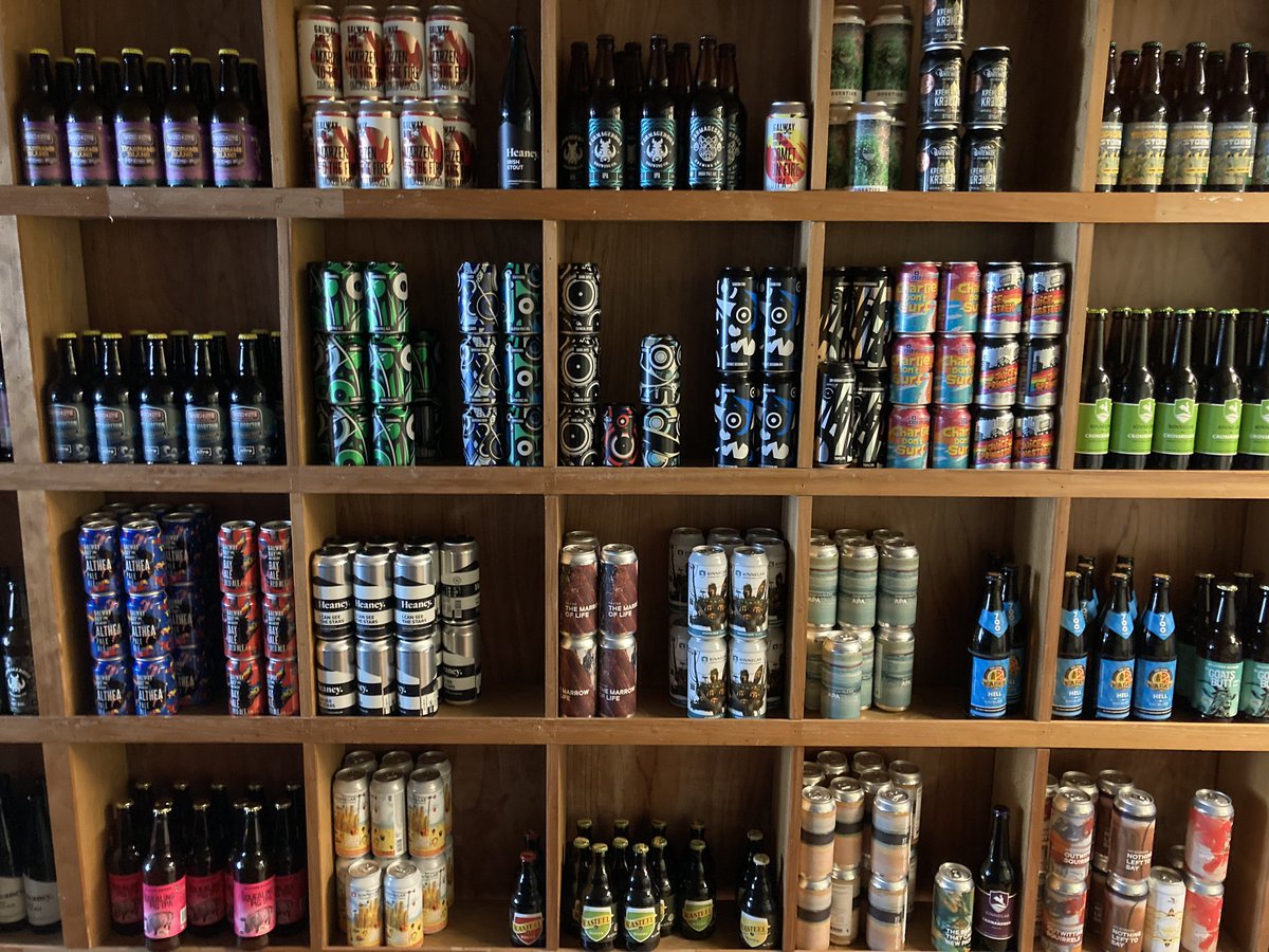 neillwine's tweet photo. Beer wall @neillwine has taken a bit of a beating but we are doing our best to keep it stocked. Have a browse of the wall just like you were in the shop. Free delivery on orders over £40.00 in a 20 mile radius of our shops #callacave thanks to our suppliers for keeping us stocked https://t.co/bDxEEuinAp