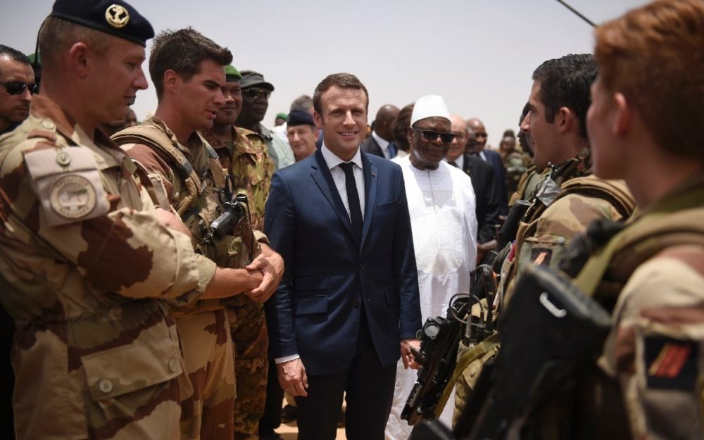 (3) He met some of the 1,600 French soldiers stationed there, at the largest French military base outside of France. France intervened in Mali in January 2013 in an effort to drive out Tuareg rebels which had taken advantage of the unrest and conflict created by a rebellion