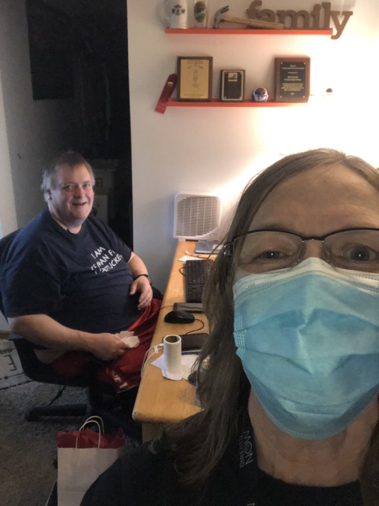 Look at Bob working with a customer as he receives his LaFamilia goody bag.