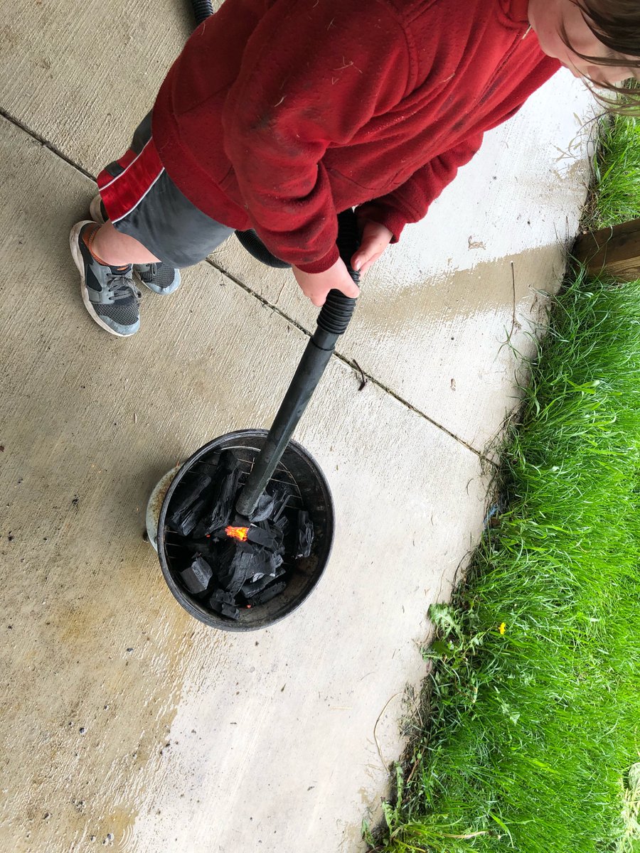 Had my little helper put in charcoal and run the shop vac blower to get things going.