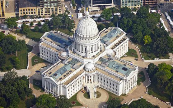 looking at the state capitol buildings of different states, wisconsin has a good one, looks like a giant nipple pasty, great building, looks cool as all hell, because of the tit stuff.