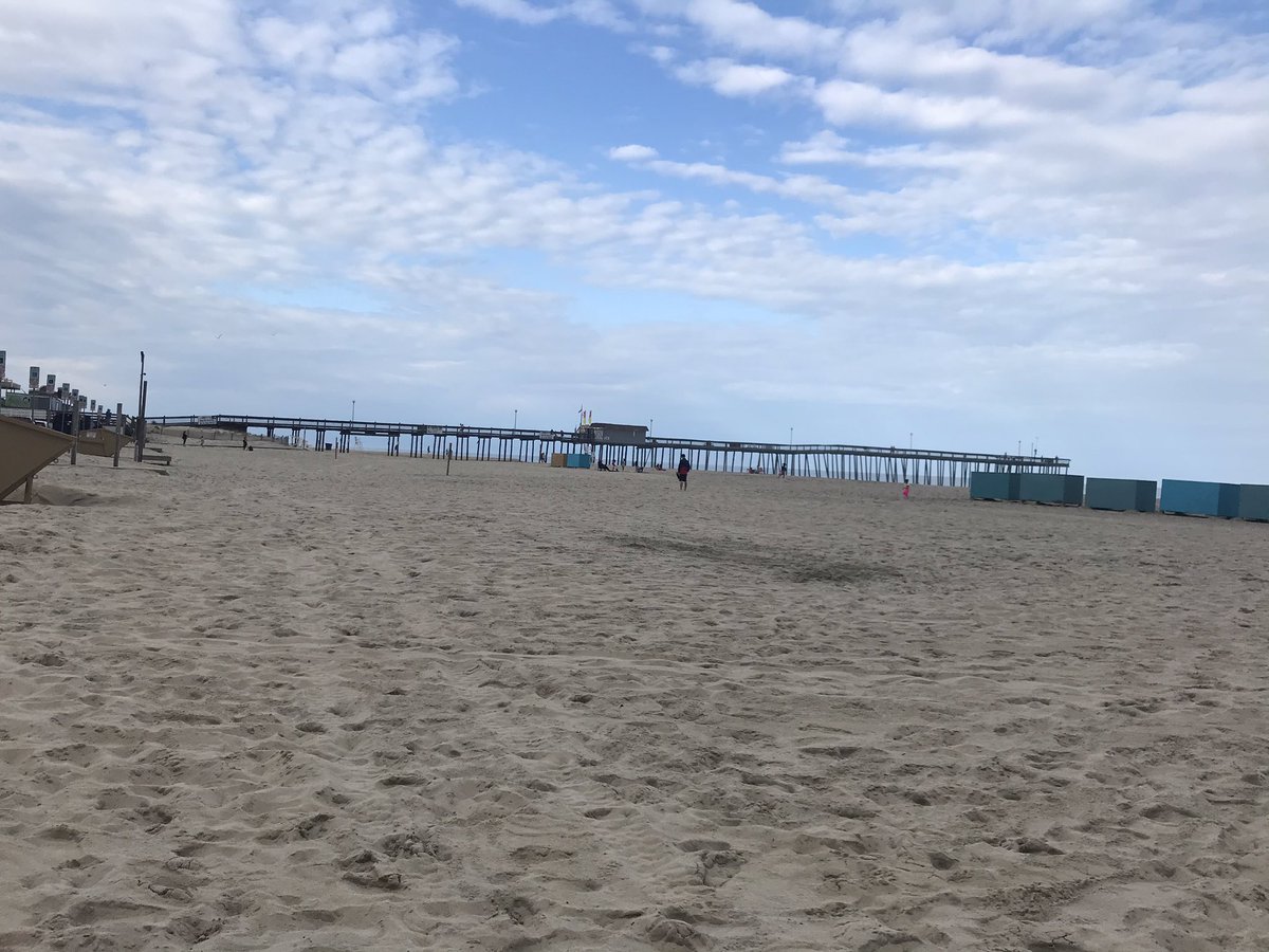 The clouds are rolling in now. People were socially distanced on the beach