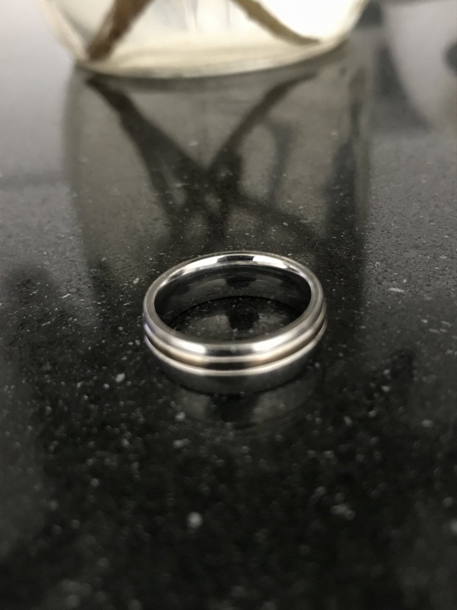 ChauTLam's tweet photo. Searching for owner of this 
silver/gold ring. Found on Center Boulevard in #Long Island City. If this band is yours, describe engraving. #lostring #lostandfoundring #ringfinder #LIC https://t.co/hjgE0E8p47