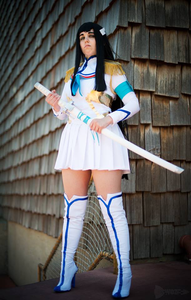 12. I hot glued the blue stripes on her boots while they were on my legs and why would I ever think that was a good idea but oh, did I do it LOL I also accidentally dropped the sword off a second floor balcony right before the shoot (Photo:Swoz)