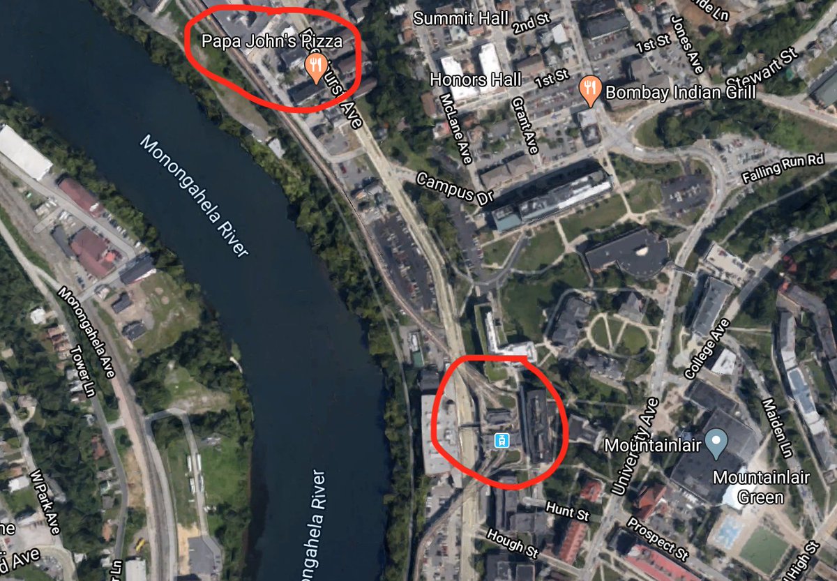 And just so we're all clear, the Papa John's Affordable Housing Cinderblock Palace is a ten minute walk from the Morgantown PRT. (You can see the line in the background.) So it's technically TOD and essentially a perfect urbanist development.