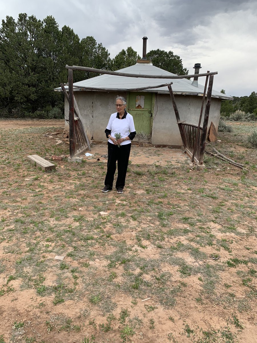 AdamsBleu's tweet photo. My mother pictured in front of my great grandmothers hogan on the Navajo Nation and in her new home, also on the Navajo Nation. #NavajoNation https://t.co/oOjDb7qCoL