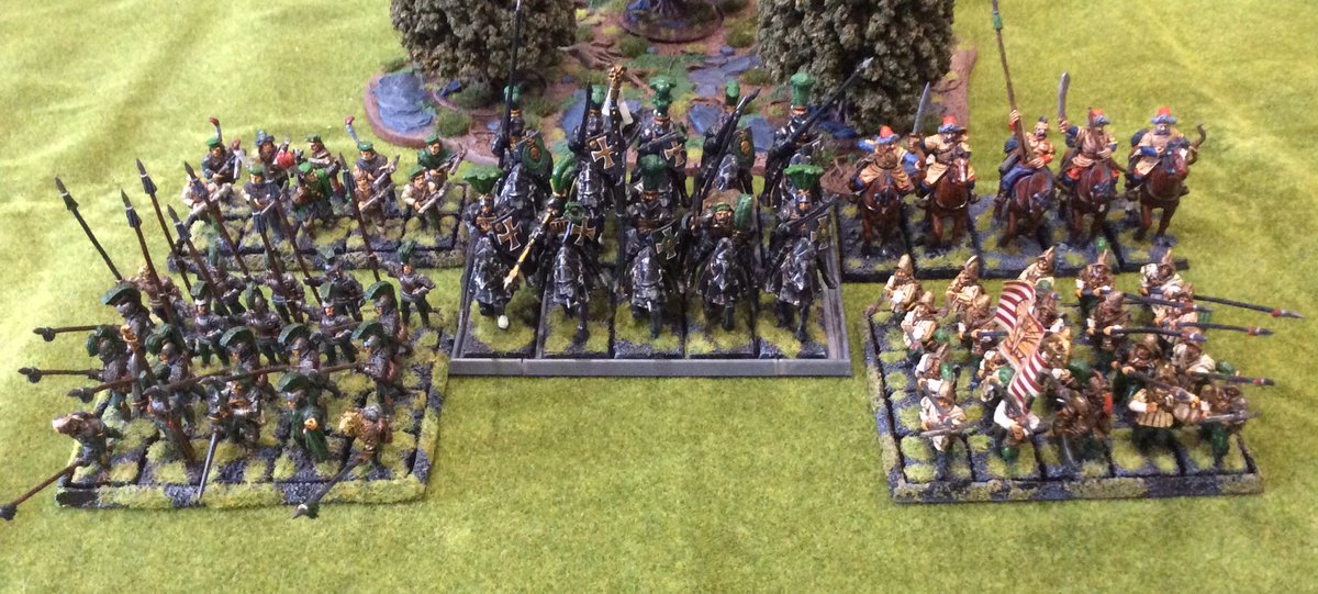 Another Oathmark battle report! The Goblins continue to probe the kingdom’s defences. A raiding party is heading for Blue Tree gap. A scratch company reinforced by a detachment of knights races to block this vital LOC before the Goblins can capture it.