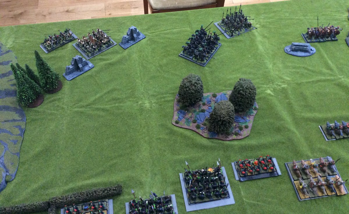 Initial movements were a little cagey as each side tried to manoeuvre the other into a trap. Continual goblin missile fire was causing some problems already though and finally the goblin light cavalry committed to a charge against the heavy cavalry. It cost them but...
