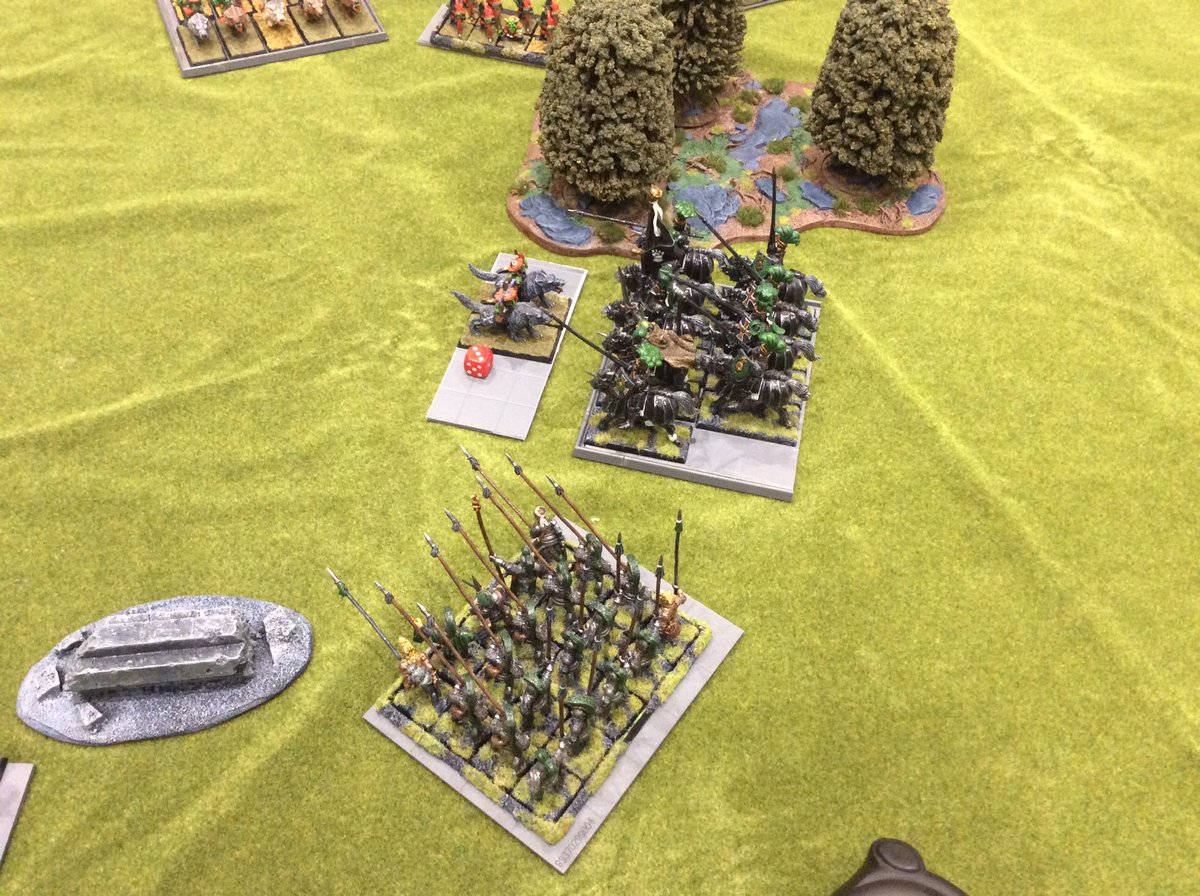 It jammed up the human troops and forced them to commit. The Wolf riders survived long enough to allow reinforcements to to commit. Meanwhile on the other side, the defensive actions of the pike unit had left it open to missile attrition... finally, sensing their danger, they...