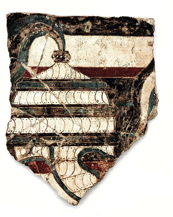 Such helmets are also seen in artistic depictions, such as this detail from the wall-paintings of Xeste 4, at Akrotiri on Thera. Visible in the depiction are the holes in the tusk plates to connect it to the fabric beneath.Image: Archaeological Museum of Thera, (Inv. No. 11548)