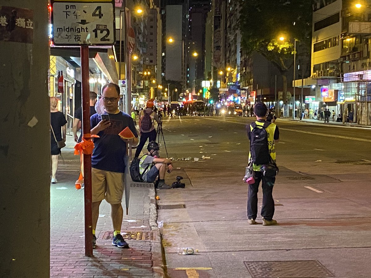 What do you need when you are out on a street with protesters at one end and riot police at the other in a summer night in Hong Kong? 