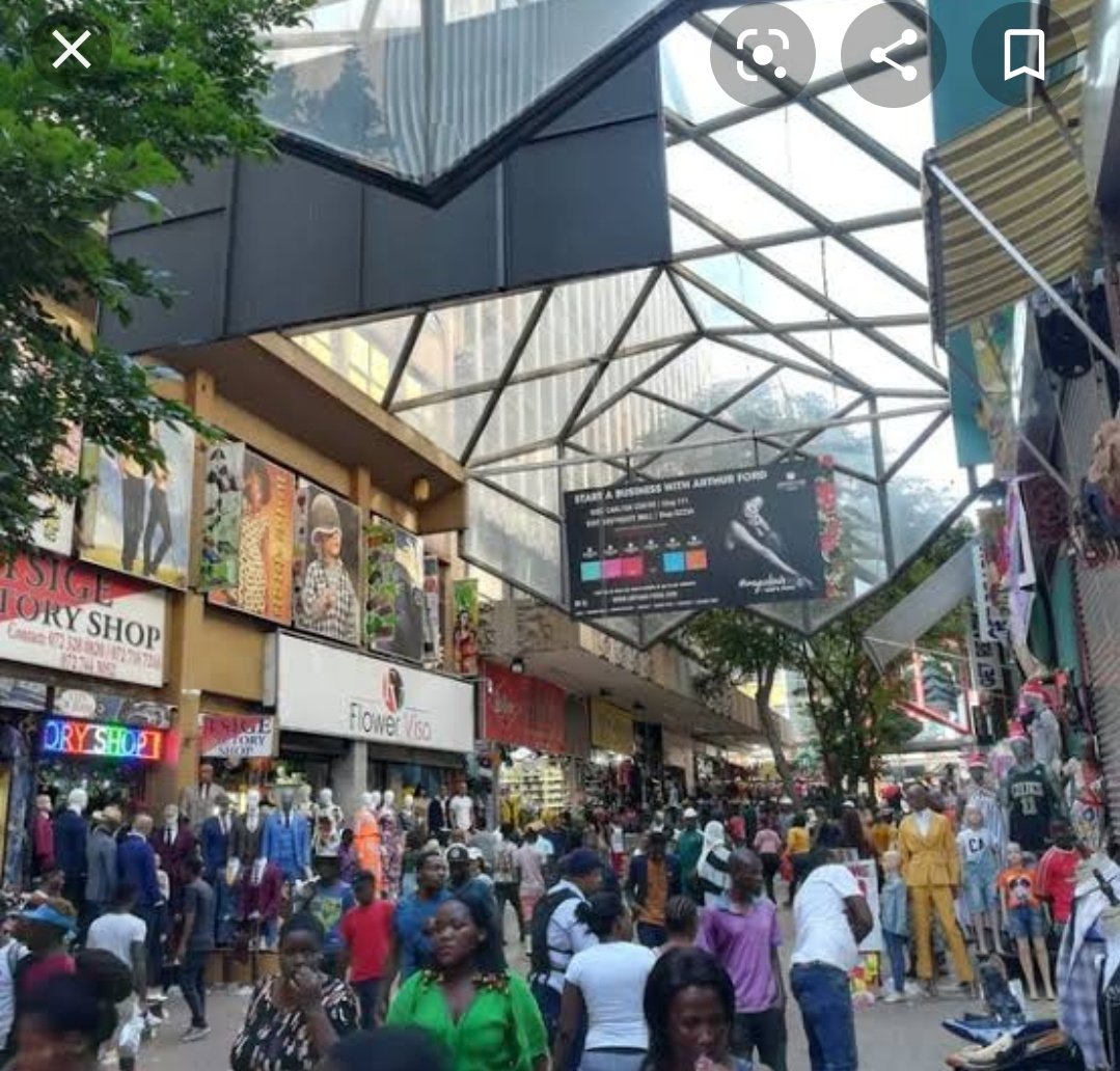 Small street in downtown Johannesburg - Kenyatta market in Nairobi.  #SAandKE