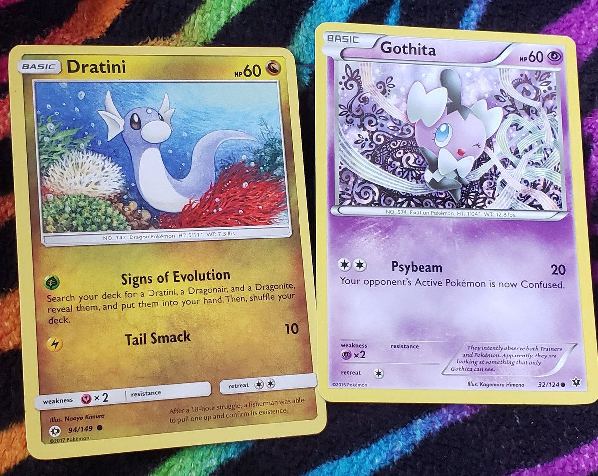 dratini and gothita!!once again these two cards have rlly pretty art!! i especially like gothita!!