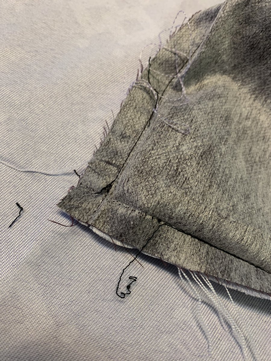 once you’ve seamripped that backstitched section, pull out a section of the thread so there’s enough to grab, and go find the end of the seam. you don’t have to seamrip the whole end, just a little section