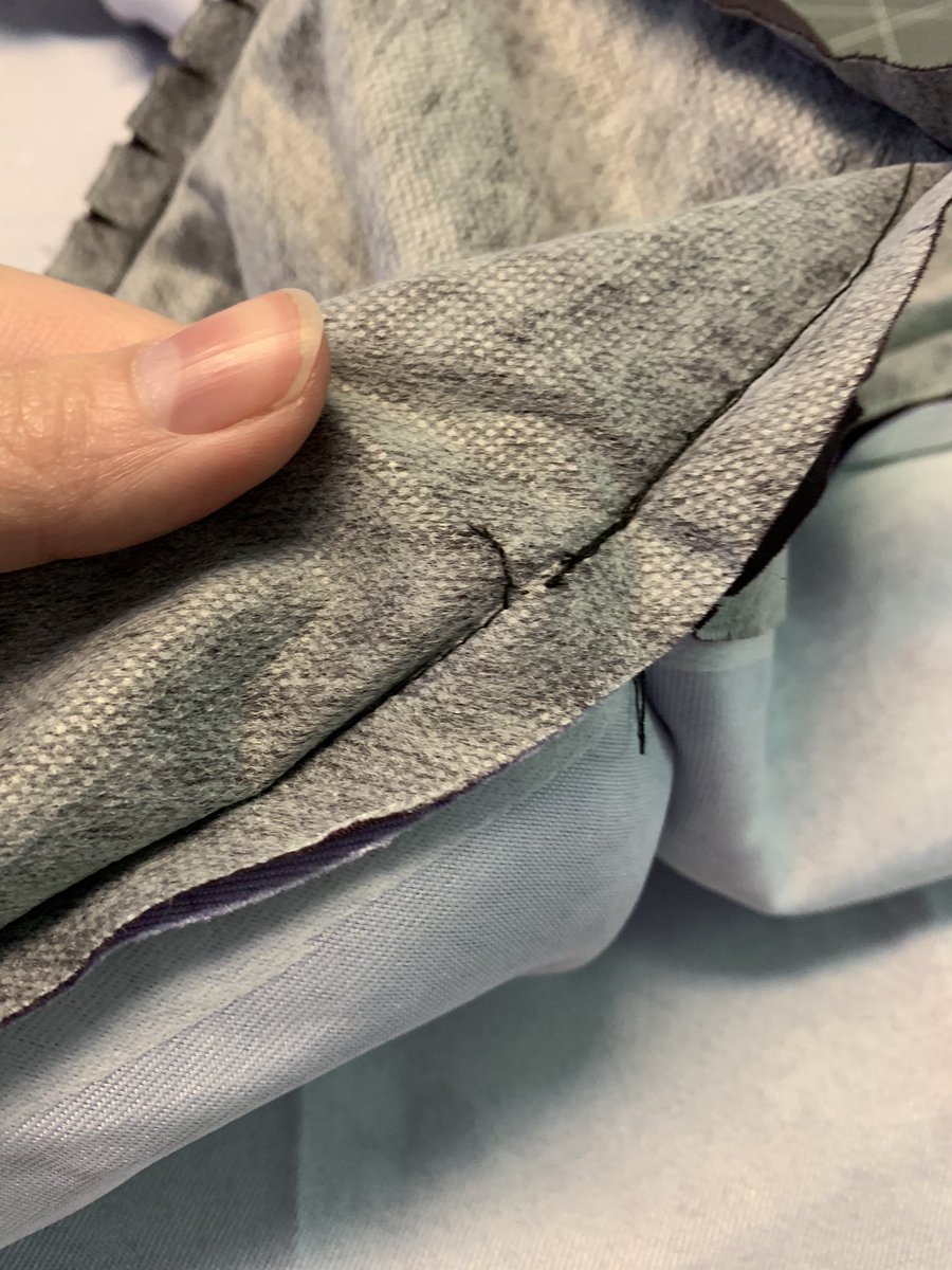 once you’ve seamripped that backstitched section, pull out a section of the thread so there’s enough to grab, and go find the end of the seam. you don’t have to seamrip the whole end, just a little section